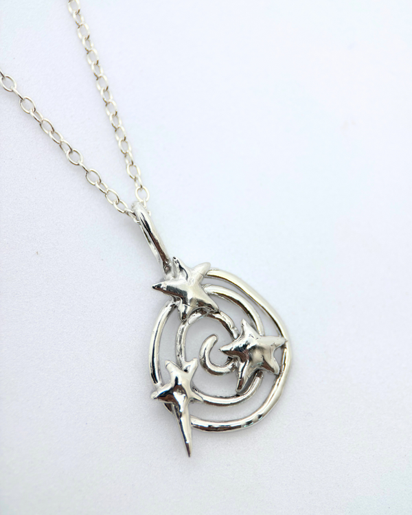 spiral swirly star charm in silver